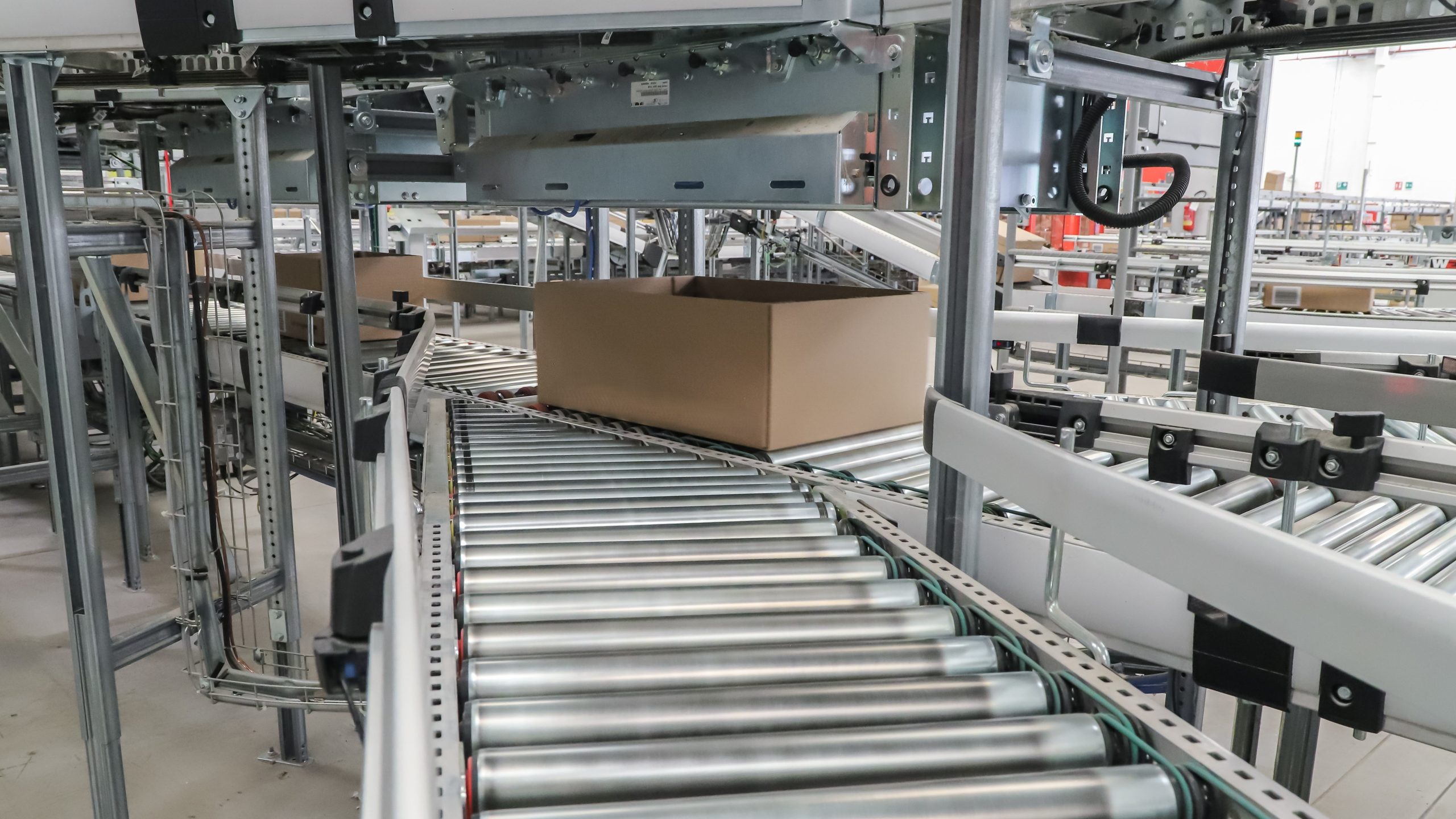 Packing,Line,In,A,Logistics,Warehouse.,Conveyor,Belt,In,A